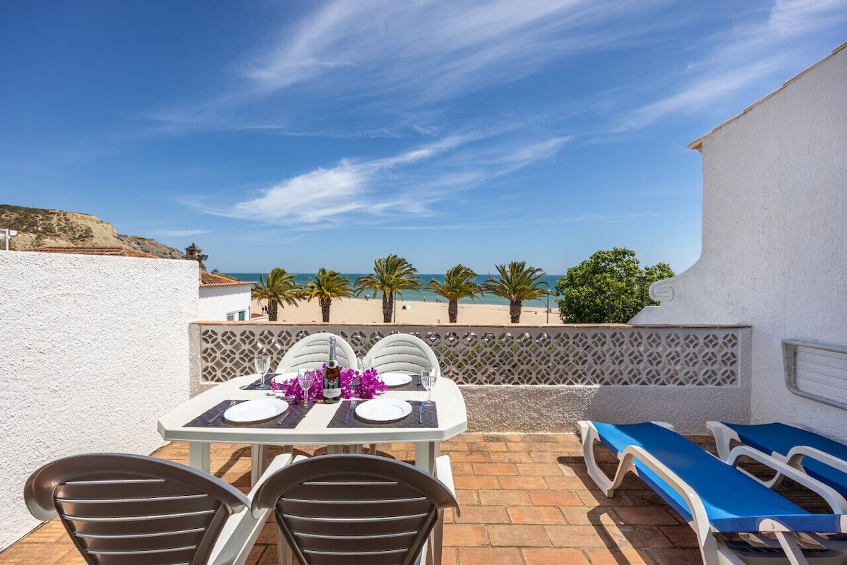 Sunlit private terrace overlooking the sea